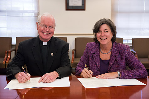 Father Kevin Gillespie and Dr. Karen A. Stout